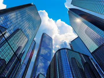 buildings and clouds from below